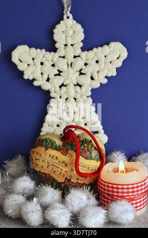 Angel with Heart-shaped Christmas Ornament,Sheet Music Pattern,Christmas Greeting Card Stock Photo