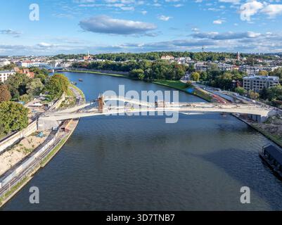 Krakow, Poland, New special bridge under construction over Vistula river for pedestrians and cyclists aiming to join Ludwinow and old Jewish Kazimierz Stock Photo