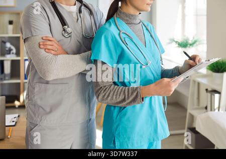 Close-Up Of Doctor And Nurse Team In Hospital Stock Photo