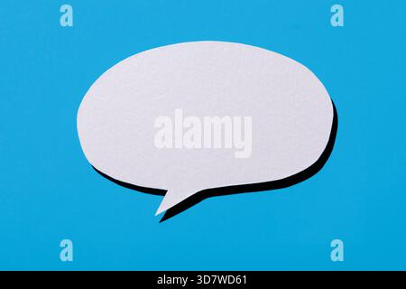 Blank thought bubble on blue background Stock Photo
