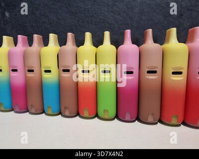 Generic vapes, e-cigarettes. Concept background for concern over health, cancer, plastic use, environment, habit, youth, smoking, vaping. Refillable, Stock Photo
