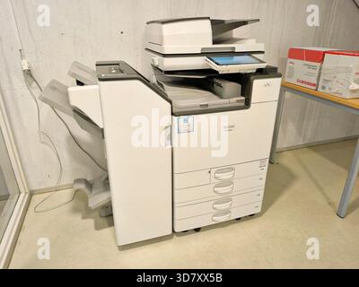 Heavy-duty printing machine featuring numerous drawers and compartments, commonly used in industrial or commercial print production settings Stock Photo