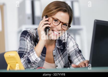 technician talking on mobile phone Stock Photo