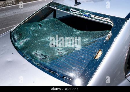Shattered vehicle window after vandalism Stock Photo