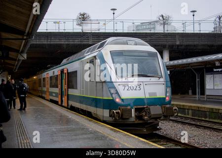 Commuter train at Stavanger Railway Station on a rainy day, Norway. Stock Photo