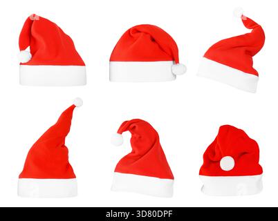 Six red and white Santa Claus hats displayed in different angles and styles, isolated on a clean white background. High quality photo Stock Photo