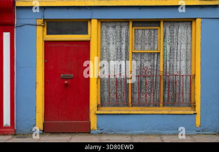 Painted exterior of a building on the main street in Macroom in County Cork in Munster region of Ireland Stock Photo