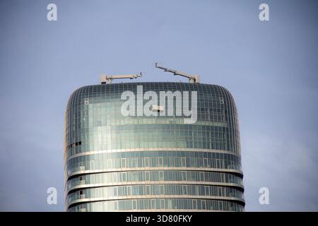 a basket with window washers on the top floors of the Belgrade Tower Stock Photo