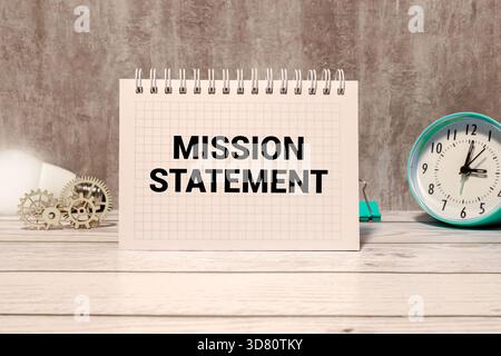 MISSION STATEMENT is written on a wooden blocks on a chart background Stock Photo