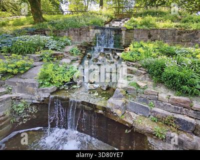 small waterfall in the northern park, Germany, Hesse, Bad Nauheim Stock Photo
