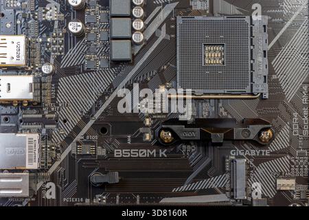 BANGKOK, THAILAND, NOV 10 2025, Gigabyte Motherboard Close-Up Showing CPU Socket, PCIe, and Circuitry Details for High-Performance PCs Stock Photo