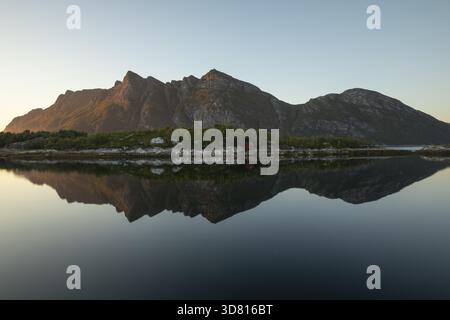 Sunset over Festvag near Bodo. Reflection of mountains in the fjord Stock Photo