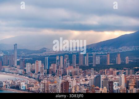 Benidorm Skyline with Dramatic Sun Rays Stock Photo