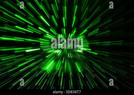 Green streaking light trails on black background Stock Photo