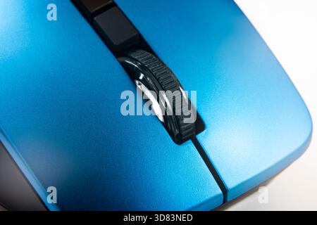 Blue Wireless Computer Mouse Scroll Wheel Macro Closeup On White Background, Modern Technology Hardware Ergonomics Navigation Stock Photo