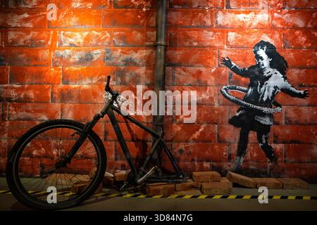Poland, Krakow, Banksy Museum, Hula Hooping Girl, 2020, Nottingham Stock Photo