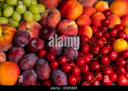 Ripe summer fruit displaying a colorful gradient, rich in vitamins and freshness Stock Photo