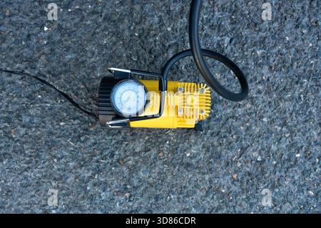 Close up of a multimeter for measuring voltage and current on asphalt Stock Photo
