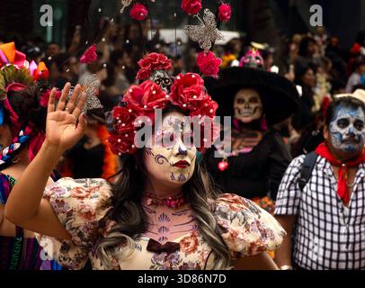 People in costumes parade participate in Day of the Dead parade in Mexico City, Mexico Stock Photo