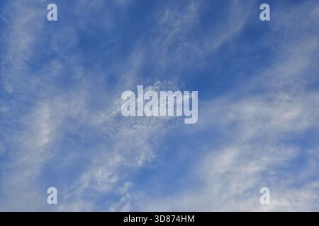 Clear blue sky with a few clouds Stock Photo