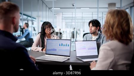 Analyzing Financial Data With Diverse Team During Virtual Business Meeting. Stock Photo