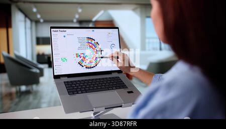 Digital Planner Helps Woman Track Goals And Improve Wellness Daily Stock Photo