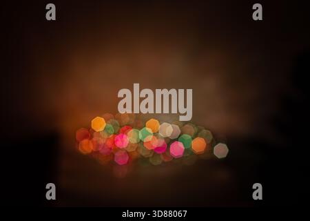 Colorful bokeh lights in circular shapes creating a dreamy abstract background Stock Photo