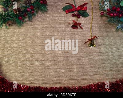 Christmas Decorations Golden Background - Festive Christmas decorations frame a shimmering gold background with ample copy space. Perfect for holiday Stock Photo