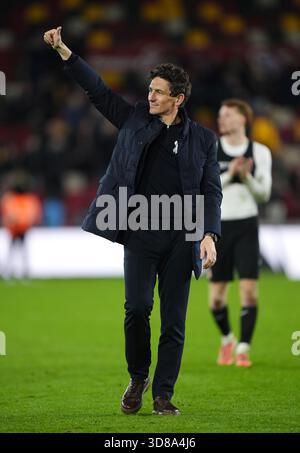 Brentford manager Keith Andrews salutes the fans after the Premier ...