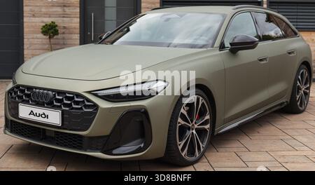 Slovenia, Ljubljana - 6 October 2025: Audi A5 is parked in a sleek driveway Stock Photo