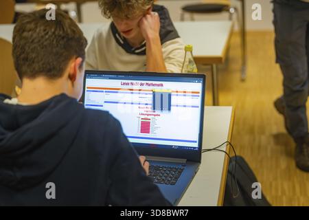 Young people learn mathematics with a laptop in a classroom, Jugend Forschungszentrum Nagold, Calw district, Germany Stock Photo