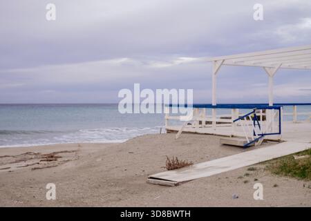 Wood construction on a Sicilian beach overlooking the Mediterranean Sea Stock Photo