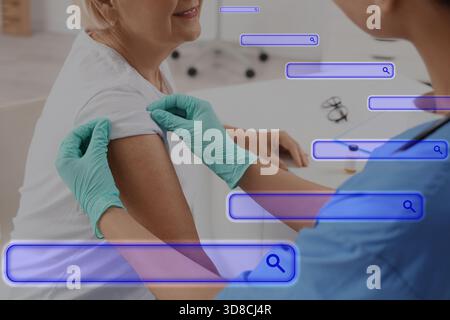 Doctor and senior woman in clinic and search fields on virtual screen Stock Photo