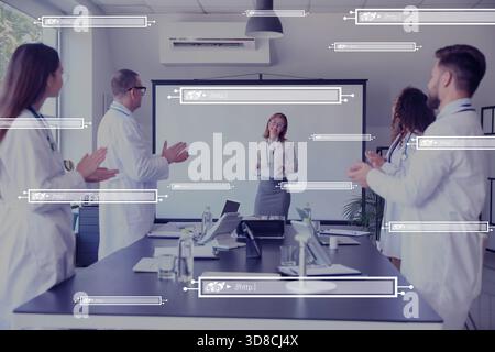 Team of doctors during meeting in clinic and search fields on virtual screen Stock Photo