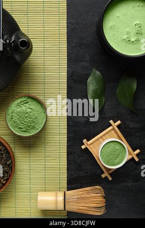 Composition with powdered matcha tea and accessories on dark background, closeup Stock Photo