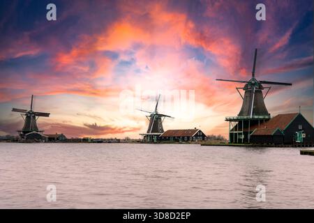 Magic picture of traditional Dutch windmills in the rural landscape of Zaanse Schans Stock Photo