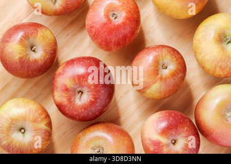 Top view of juicy apples on a wooden table Stock Photo