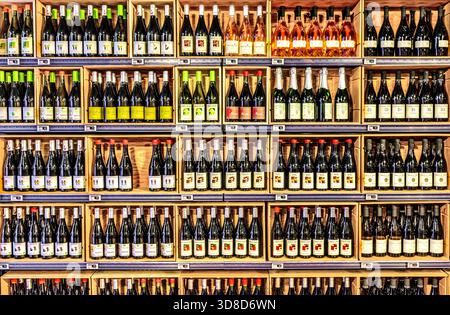 Intermarche supermarket display of assorted bottles of red wine, white wine and rosé wine  - Yzeures-sur-Creuse, Indre-et-Loire (37), France. Stock Photo