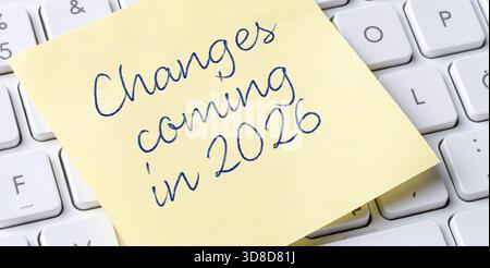 Sticky note on a keyboard - Changes coming in 2026 Stock Photo