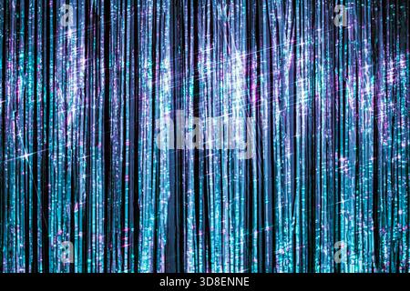 Intense blue hues, vertical alignment, bright glitter shine, festive and modern look. Dramatic contrast, elegant texture, crisp illuminated design Stock Photo