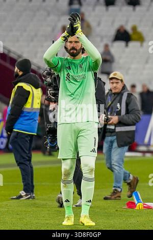 Liverpool goalkeeper Alisson Becker applauds the fans following the ...