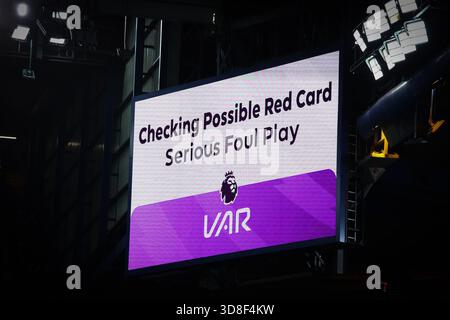 The big screen shows a VAR check for a penalty against Arsenal which is ...