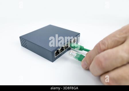 Ethernet switch box port on a white Stock Photo