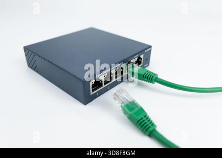 Ethernet switch box port on a white Stock Photo