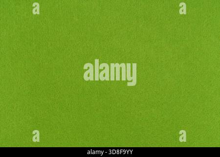 Light green felt texture background - close-up of soft fabric surface. Seamless background, graphic design, scrapbooking, textile layouts, creative. Stock Photo