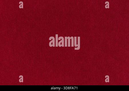 Burgundy, dark red felt background - close-up of a soft fabric surface. Seamless background, graphic design, scrapbooking, textile layouts, creative. Stock Photo