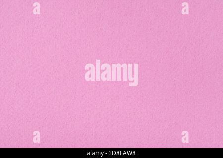 Light pink felt background - close-up of the soft surface of the fabric. Seamless background, graphic design, scrapbooking, textile layouts, creative. Stock Photo