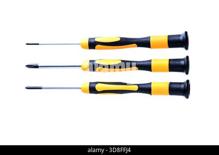 Close-up of three screwdrivers with different heads on a white background Stock Photo