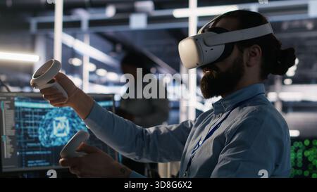 Data center developer using virtual reality technology to visualize artificial intelligence LLM neural networks. Server farm IT expert using VR headset equipment to oversee AI systems, camera A Stock Photo