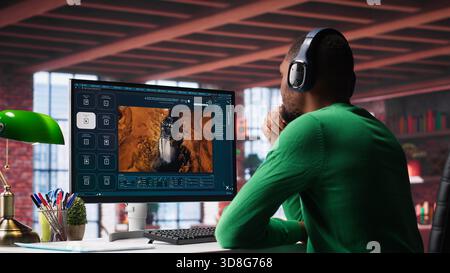 Digital editor uses AI powered text to video generator to create content, listening to music on headset. Internet connectivity and artificial intelligence tools on high tech software. Camera A. Stock Photo
